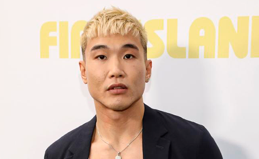 Joel Kim Booster at the premiere of the film FIRE ISLAND.